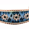 Flower Bracelet with Black Leaves Blue Background Design