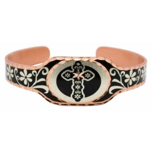 Unique handcrafted copper bracelet with ornate cross and flower design on a black background. Unique handcrafted copper cross and flower bracelet featured in our handmade jewelry guide to retention marketing.