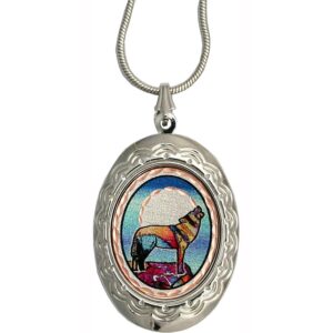 Distinctive artisan copper locket featuring an exceptional howling wolf design, highlighting our tips for choosing the perfect wolf jewelry for your girlfriend. Astonishingly elegant handmade copper howling wolf locket necklace. Artisan-crafted sophistication and flawless quality make this the absolute best wolf jewelry for your girlfriend!
