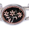 Handcrafted artisan bracelets, silver plated wire bracelet decorated with copper flower design with black background