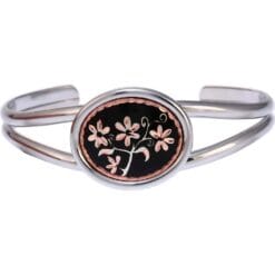 Handcrafted artisan bracelets copper flower design with black background