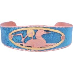 Handcrafted bracelet created in blue patina with cut out loon design