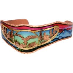 Cut out eagle bracelet in gold and copper with colorful copper cuff background