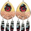 Cut out gold and copper NW Haida bear earrings with colorful dangle backdrop