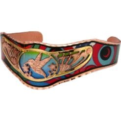 Cut out Native Haida hummingbird bracelet in gold and copper with colorful copper cuff background
