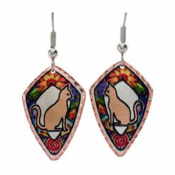 Copper cat earrings handmade in colorful flowers as background