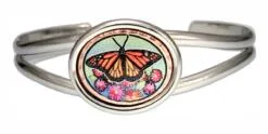 Buy silver-plated wire bracelets with oval bezels, embellished with copper colorful monarch butterfly artwork