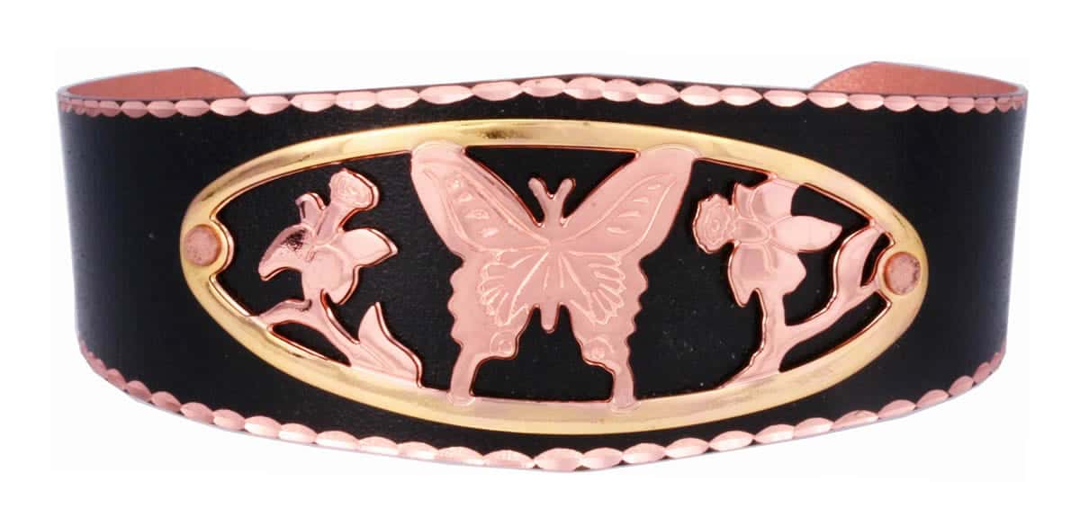 Buy delicate cut out butterfly bracelet in gold and copper mounted on black patina cuff bracelets. No polishing required. Buy delicate cut out butterfly bracelet in gold and copper mounted on black patina cuff bracelets. No polishing required.