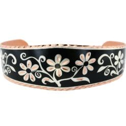 Black background flower bracelet handmade from copper with diamond cutting to sparkle