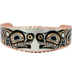 Native Haida bear bracelet made from copper accentuated with silver and black colors