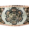 Make a bold style statement by wearing this fascinating Native Haida sun totem bracelet