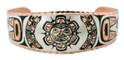 Make a bold style statement by wearing this fascinating Native Haida sun totem bracelet