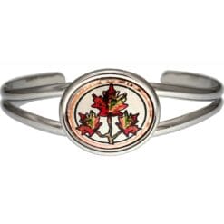 Wire bracelet in silver color embellished with maple leave artwork in vibrant colors