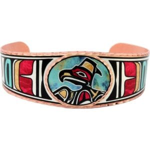 Handcrafted copper Native American eagle bracelet, demonstrating how to clean copper jewelry.