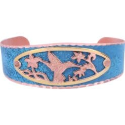 Native Haida hummingbird cut out bracelet embellished with patina blue background copper cuff