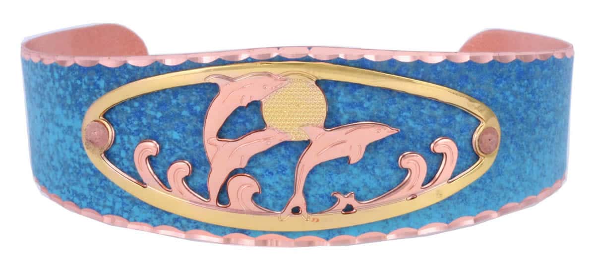Blue patina copper cuff bracelet decorated with cut out dolphins design in copper and gold colors Blue patina copper cuff bracelet decorated with cut out dolphins design in copper and gold colors
