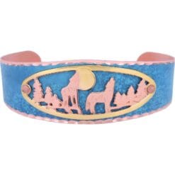 Handcrafted bracelets created in blue patina with cut out howling wolves designs