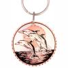 Buy original and stylish dolphins keychains handmade from copper accentuated with silver and black colors.