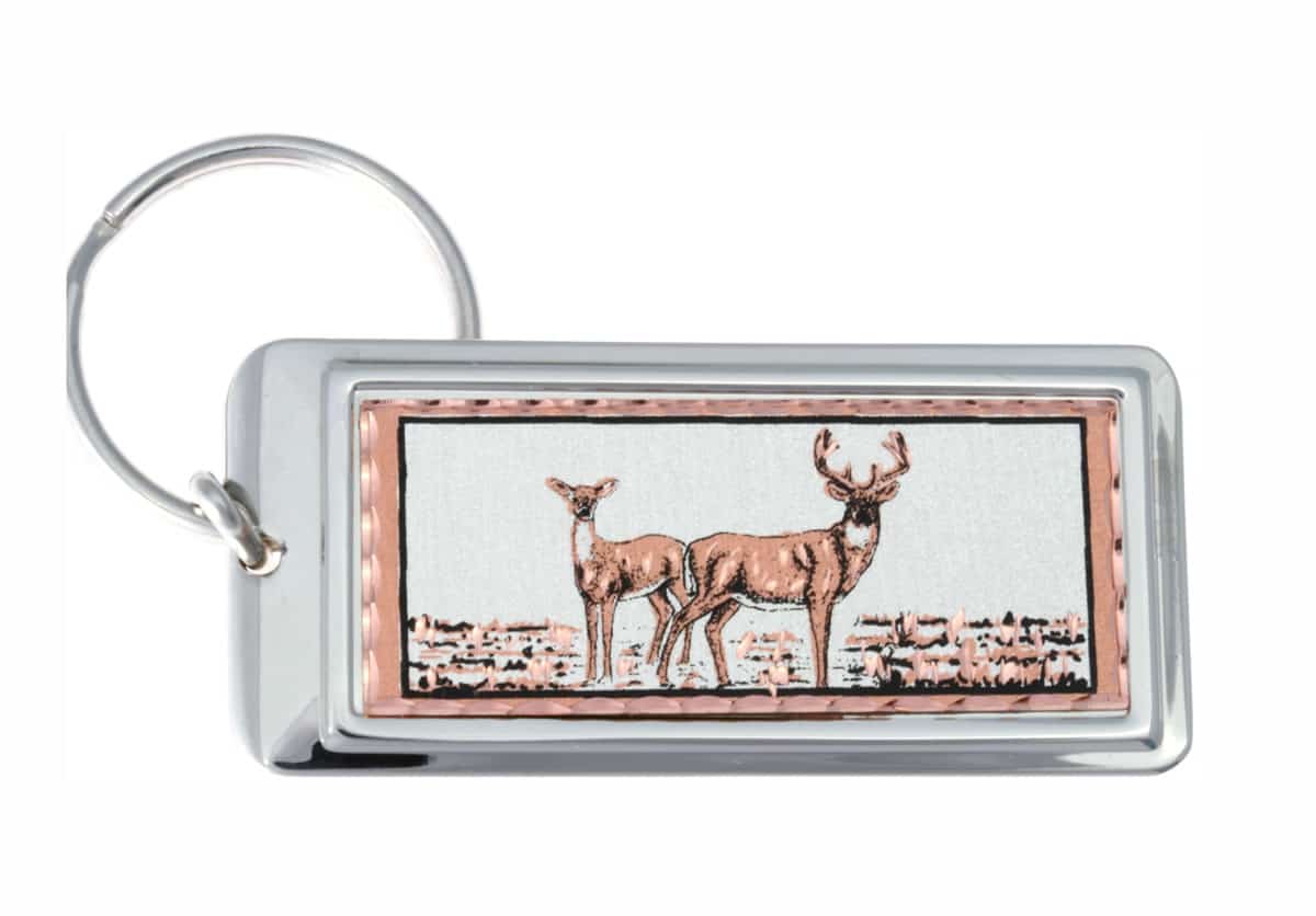 Rectangular silver-plated keychains decorated with copper whitetail deer artwork Rectangular silver-plated keychains decorated with copper whitetail deer artwork