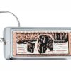 Rectangular silver-plated keychains decorated with copper cub and bear artwork Rectangular silver-plated keychains decorated with copper cub and bear artwork