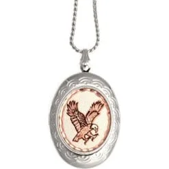 Handmade swooping bald eagle copper oval locket necklace in an engraved silver frame