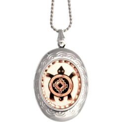 Handmade Southwest Native American style turtle photo locket necklace in engraved silver and diamond-cut copper.