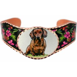 Dachshund Bracelets, aptivating handmade dog jewelry tan dachshund bracelet. This beautifully unique, adjustable copper cuff bracelet features a charming tan dachshund portrait set against a black background with vibrant pink floral motifs, making it a thoughtful gift for her or a perfect gift for pet lovers.