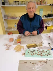 How We Make Copper Jewelry: Artisan hand-assembling handmade copper earrings with hypoallergenic surgical steel ear wires.
