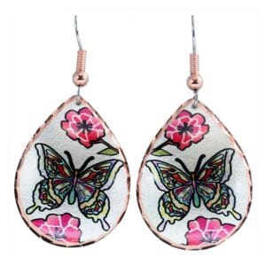 Colorful copper butterfly earrings handmade for unique gift giving. Colorful copper butterfly earrings handcrafted for nature lovers, representing the best handmade jewelry gifts for women.