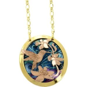 Cut out flowers and hummingbird necklace Beautiful etched copper and gold-filled hummingbird necklace. Discovering how to accessorize with handcrafted necklaces can elevate your everyday style!