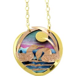 Cut out gold and copper Loons Necklace with colorful copper background