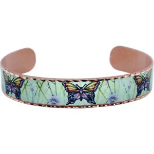 Handmade copper cuff bracelet featuring a colorful butterfly design, beautifully illustrating what makes handmade jewelry more valuable.