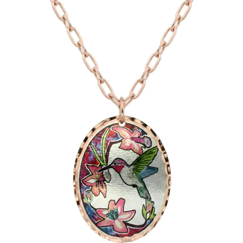 Experience the enchanting spirit of flight with this artisanal colorful copper hummingbird necklace. Skilled creators hand-forge each lovable and precious bird pendant from high-quality copper. The pretty and sweet design features alluring translucent colors that make this an outstanding piece of art.