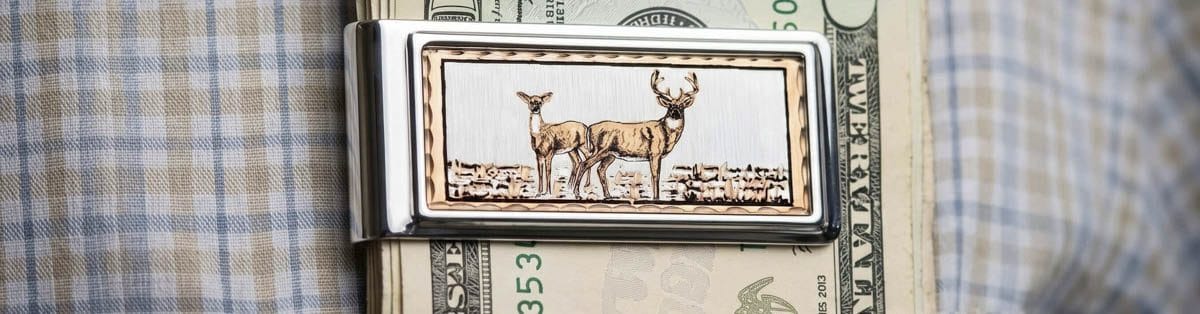 A banner showcasing handcrafted copper money clips for men, featuring intricately hand-finished, light-catching wildlife and western designs.