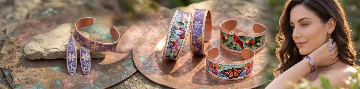 Artisanal, nature jewelry, highlighting colorful wildlife and earth-tone motifs in tarnish-proof finishes.